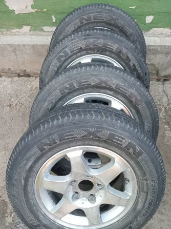 Продам комплект шин 215х70х15 на титанахR15 Херсон