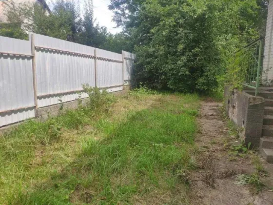 Продаж цегляного дому з ділянкою 9 сот. 2 пов. + гараж Ржищів