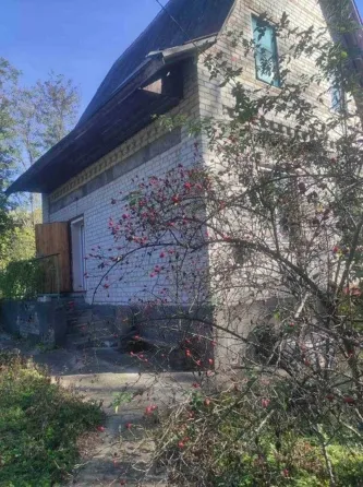 Продаж цегляного дому з ділянкою 9 сот. 2 пов. + гараж Ржищів